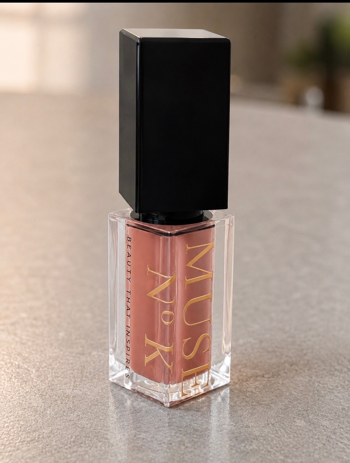 Muse No K Chiffon Kiss Lip Veil — warm nude lip gloss, brand packaging